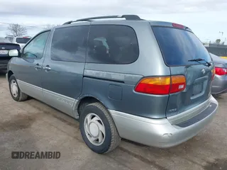1999 Toyota Sienna LE with VIN 4T3ZF13C2XU136847, listed as a IAAI auction lot 41663608 with 178,581 mi miles. Bid and sale history available at carsss.com. Image 3.
