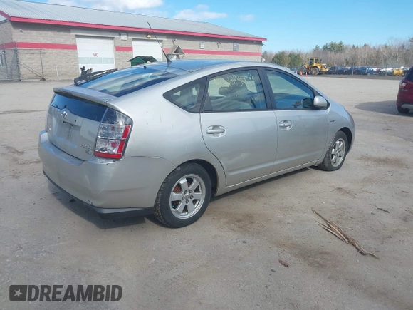 2005 Toyota Prius with VIN JTDKB20U653014332, listed as a IAAI auction lot 42010139 with 128,147 mi miles. Bid and sale history available at carsss.com. Image 4.