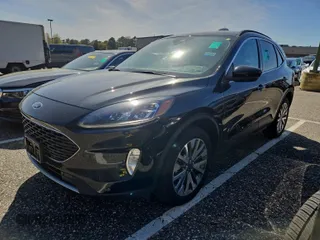 2022 Ford Escape Titanium with VIN 1FMCU9J9XNUA73925, listed as a IAAI auction lot 42201679 with 60,292 mi miles and . Bid and sale history available at DreamBid. Image 1.