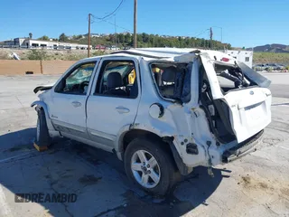 2005 Ford Escape Hybrid with VIN 1FMCU96H55KD91317, listed as a IAAI auction lot 41813426 with 250,978 mi miles. Bid and sale history available at carsss.com. Image 3.