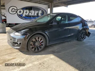 2022 Tesla Model Y Performance с VIN 7SAYGDEF5NF339965, выставлен на аукционе Copart как лот 62187545 с пробегом 93 156 миль миль и Списание • Salvage title. История ставок и продаж доступна на DreamBid. Изображение 1.