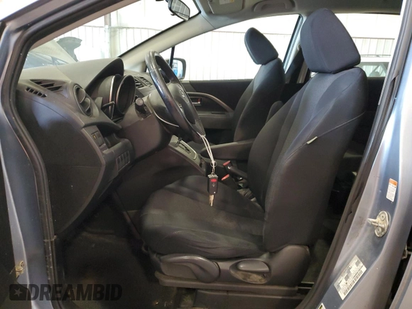 2012 Mazda 5 Touring with VIN JM1CW2CL0C0105090, listed as a Copart auction lot 74963864 with 88,759 mi miles and Salvage Title. Bid and sale history available at DreamBid. Image 7.