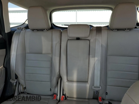 2014 Ford Escape Titanium с VIN 1FMCU0J96EUD41199, выставлен на аукционе Copart как лот 59380245 с пробегом 100 319 миль миль и Списание • Salvage title. История ставок и продаж доступна на DreamBid. Изображение 10.