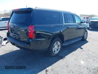 2015 Chevrolet Suburban LT z VIN 1GNSKJKC2FR162921, wystawiony jako IAAI lot #41961114 z przebiegiem 296 918 mil mil oraz . Historia ofert i sprzedaży dostępna na DreamBid. Obrazek 4.