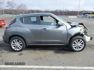 2015 Nissan Juke SV with VIN JN8AF5MVXFT553675, listed as a IAAI auction lot 41815944 with 100,000 mi miles and . Bid and sale history available at DreamBid. Image 14.