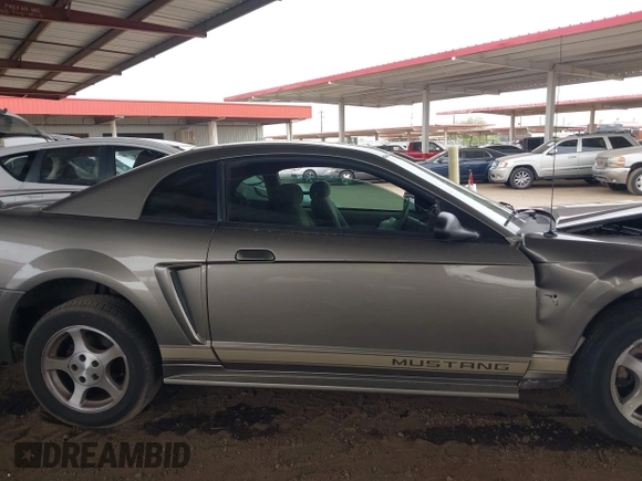 2002 Ford Mustang Standard z VIN 1FAFP40482F157569, wystawiony jako IAAI lot #42372535 z przebiegiem 76 944 mil mil oraz . Historia ofert i sprzedaży dostępna na DreamBid. Obrazek 13.