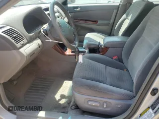 2005 Toyota Camry STD с VIN 4T1BE32K45U041477, выставлен на аукционе Copart как лот 57129635 с пробегом 216 497 миль миль и Списание • Salvage title. История ставок и продаж доступна на DreamBid. Изображение 7.