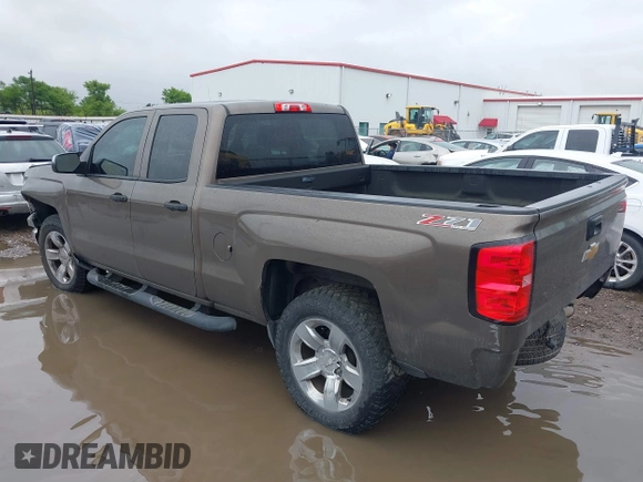 2014 Chevrolet Silverado 1500 LTZ with VIN 1GCVKSEC5EZ249444, listed as a IAAI auction lot 41904569 with 123,650 mi miles and . Bid and sale history available at DreamBid. Image 3.