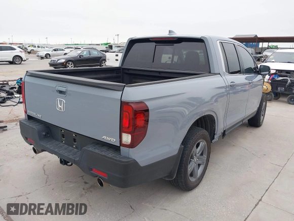 2023 Honda Ridgeline RTL with VIN 5FPYK3F58PB047099, listed as a IAAI auction lot 42313390 with Not provided miles and . Bid and sale history available at DreamBid. Image 4.