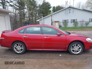 2013 Chevrolet Impala LTZ with VIN 2G1WC5E32D1102744, listed as a IAAI auction lot 42029654 with 93,506 mi miles and . Bid and sale history available at DreamBid. Image 14.