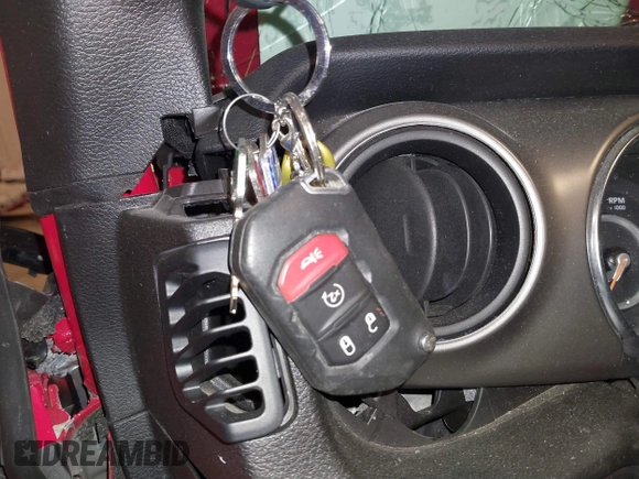 2019 Jeep Wrangler Sport S with VIN 1C4GJXAG4KW646013, listed as a IAAI auction lot 41556750 with 44,911 mi miles and . Bid and sale history available at DreamBid. Image 11.