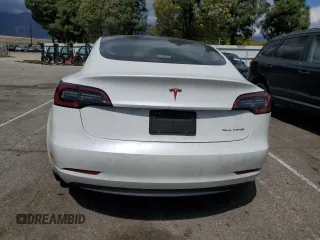 2022 Tesla Model 3 Long Range with VIN 5YJ3E1EB4NF139023, listed as a Copart auction lot 51410345 with 54,789 mi miles and Salvage Title. Bid and sale history available at DreamBid. Image 6.