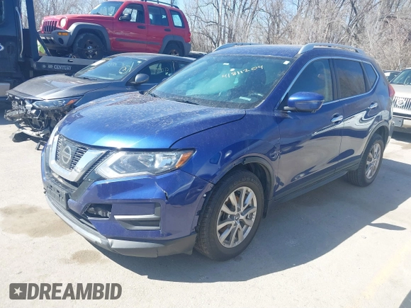 2017 Nissan Rogue SV with VIN KNMAT2MT2HP580785, listed as a IAAI auction lot 41811204 with 134,987 mi miles. Bid and sale history available at carsss.com. Image 17.