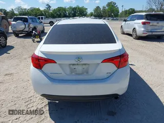 2019 Toyota Corolla L with VIN 5YFBURHE5KP880557, listed as a IAAI auction lot 41898199 with 83,003 mi miles and . Bid and sale history available at DreamBid. Image 16.