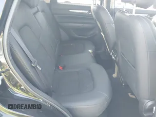 2020 Mazda CX-5 Touring with VIN JM3KFACM2L0770241, listed as a IAAI auction lot 42186952 with 41,590 mi miles and . Bid and sale history available at DreamBid. Image 8.