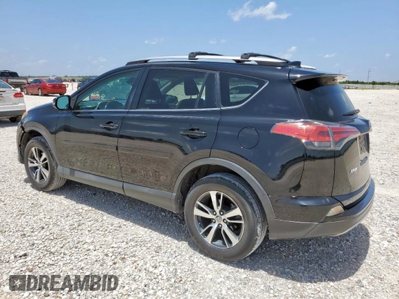 2018 Toyota RAV4 XLE with VIN 2T3WFREV7JW429716, listed as a Copart auction lot 64309045 with 156,445 mi miles and Salvage title. Bid and sale history available at DreamBid. Image 2.