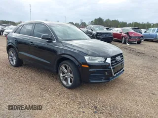 2017 Audi Q3 Premium Plus z VIN WA1JCCFS3HR002400, wystawiony jako IAAI lot #41464520 z przebiegiem 100 560 mil mil oraz . Historia ofert i sprzedaży dostępna na DreamBid. Obrazek 1.