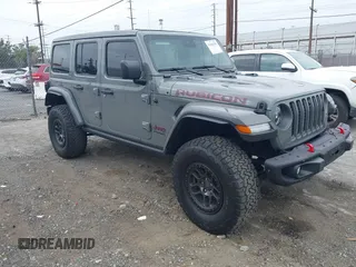 2022 Jeep Wrangler Unlimited Rubicon z VIN 1C4JJXFG9NW116302, wystawiony jako IAAI lot #41905781 z przebiegiem 23 076 mil mil oraz . Historia ofert i sprzedaży dostępna na DreamBid. Obrazek 1.