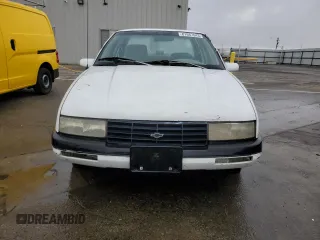 1993 Chevrolet Corsica LT z VIN 1G1LT53T4PY262289, wystawiony jako Copart lot #81687643 z przebiegiem 236 597 mil mil oraz Tytuł czysty. Historia ofert i sprzedaży dostępna na DreamBid. Obrazek 5.