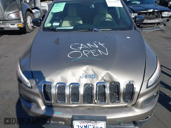 2017 Jeep Cherokee Altitude with VIN 1C4PJLAS7HW617482, listed as a IAAI auction lot 41226235 with 64,708 mi miles and . Bid and sale history available at DreamBid. Image 10.
