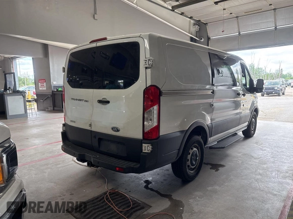 2018 Ford Transit with VIN 1FTYR1YGXJKA49048, listed as a IAAI auction lot 42843478 with 99,161 mi miles and . Bid and sale history available at DreamBid. Image 18.