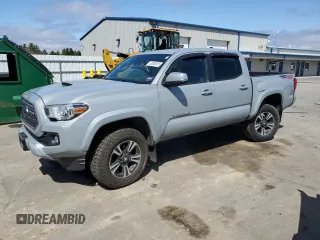 2019 Toyota Tacoma SR with VIN 3TMCZ5AN2KM233923, listed as a Copart auction lot 53952015 with 105,107 mi miles and Salvage title. Bid and sale history available at DreamBid. Image 1.