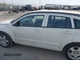 2007 Dodge Caliber SXT with VIN 1B3HB48B57D317870, listed as a IAAI auction lot 42123469 with 170,570 mi miles and . Bid and sale history available at DreamBid. Image 14.