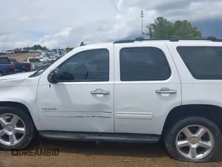 2013 Chevrolet Tahoe LS with VIN 1GNSCAE01DR260799, listed as a IAAI auction lot 42496680 with 199,276 mi miles and . Bid and sale history available at DreamBid. Image 15.