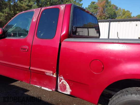 2000 Ford F-150 XL with VIN 1FTRX17L7YKA59717, listed as a IAAI auction lot 40887691 with 104,095 mi miles. Bid and sale history available at carsss.com. Image 6.