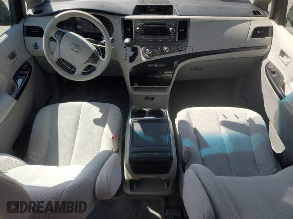 2012 Toyota Sienna LE AAS with VIN 5TDKK3DC7CS195590, listed as a Copart auction lot 57968415 with 201,732 mi miles and Salvage title. Bid and sale history available at DreamBid. Image 8.