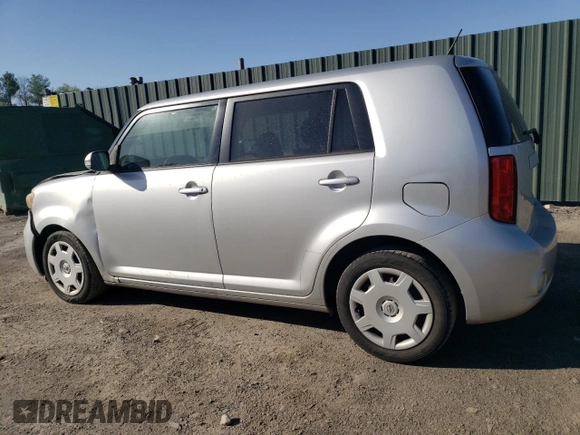 2010 Scion xB with VIN JTLZE4FEXA1098327, listed as a Copart auction lot 54733025 with 151,331 mi miles and Salvage Title. Bid and sale history available at DreamBid. Image 2.