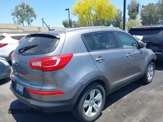 2012 Kia Sportage LX with VIN KNDPB3A2XC7273890, listed as a IAAI auction lot 39784243 with 146,067 mi miles. Bid and sale history available at carsss.com. Image 4.