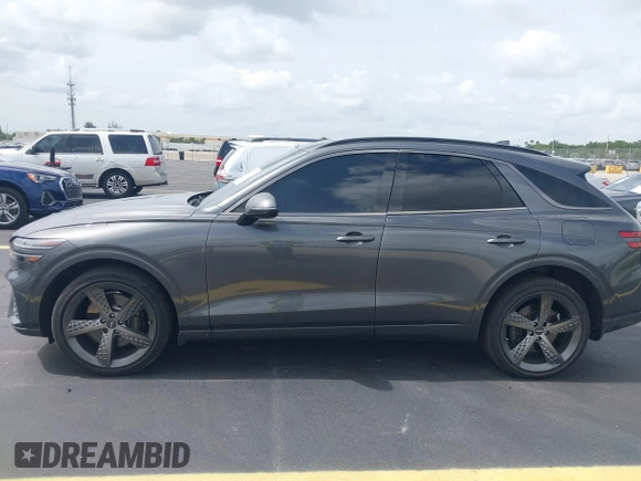 2023 Genesis GV70 2.5T with VIN KMUMADTBXPU094777, listed as a IAAI auction lot 42447363 with 31,683 mi miles and . Bid and sale history available at DreamBid. Image 14.