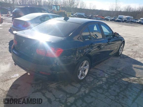 2015 BMW 3 Series 328i with VIN WBA3C1C53FK120984, listed as a IAAI auction lot 41338035 with 119,486 mi miles and . Bid and sale history available at carsss.com. Image 4.