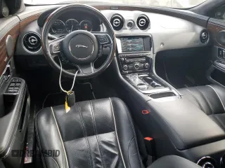 2015 Jaguar XJ with VIN SAJWA2GZ4F8V86379, listed as a Copart auction lot 42624615 with 55,803 mi miles and Salvage Title. Bid and sale history available at carsss.com. Image 8.