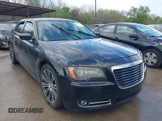 2013 Chrysler 300 with VIN 2C3CCABT4DH727357, listed as a IAAI auction lot 41910120 with 232,421 mi miles. Bid and sale history available at carsss.com. Image 1.