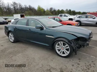 2018 Jaguar XJ Portfolio with VIN SAJWJ2GD9J8W15663, listed as a Copart auction lot 56734515 with 9,374 mi miles and Salvage Title. Bid and sale history available at DreamBid. Image 4.