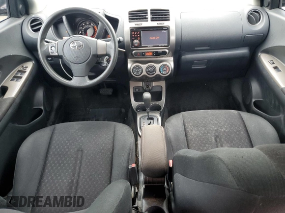 2012 Scion xD with VIN JTKKU4B45C1018313, listed as a Copart auction lot 57435535 with 121,440 mi miles and Clean Title. Bid and sale history available at DreamBid. Image 8.