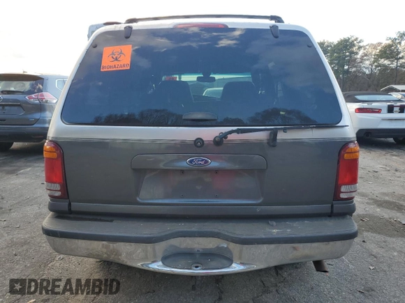 1999 Ford Explorer XLT z VIN 1FMZU32E4XUA16402, wystawiony jako Copart lot #85243074 z przebiegiem 148 110 mil mil oraz Szkoda całkowita • Salvage title. Historia ofert i sprzedaży dostępna na DreamBid. Obrazek 6.