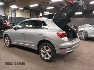 2021 Audi Q3 Premium with VIN WA1AUCF34M1078805, listed as a IAAI auction lot 42026360 with 38,473 mi miles and . Bid and sale history available at DreamBid. Image 3.