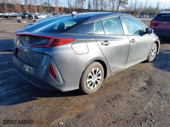 2021 Toyota Prius Prime LE with VIN JTDKAMFP1M3183950, listed as a IAAI auction lot 41526295 with 69,727 mi miles. Bid and sale history available at carsss.com. Image 4.
