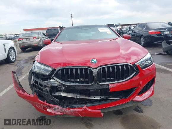 2022 BMW 8 Series M850i z VIN WBAGV8C04NCH90015, wystawiony jako IAAI lot #42020711 z przebiegiem 39 801 mil mil oraz . Historia ofert i sprzedaży dostępna na DreamBid. Obrazek 12.