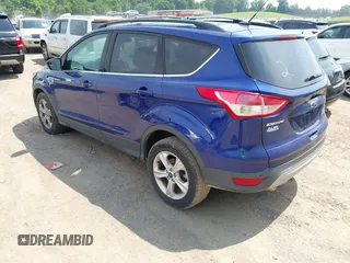 2014 Ford Escape SE z VIN 1FMCU0GXXEUB21280, wystawiony jako IAAI lot #42494933 z przebiegiem 153 131 mil mil oraz . Historia ofert i sprzedaży dostępna na DreamBid. Obrazek 3.