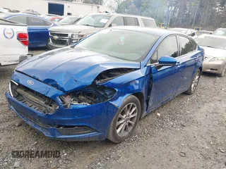 2017 Ford Fusion SE z VIN 3FA6P0H77HR309263, wystawiony jako IAAI lot #41914769 z przebiegiem 136 833 mil mil oraz . Historia ofert i sprzedaży dostępna na DreamBid. Obrazek 16.