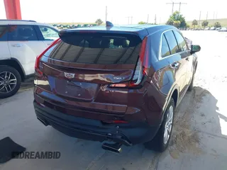 2022 Cadillac XT4 FWD Luxury with VIN 1GYAZAR42NF162880, listed as a IAAI auction lot 41850951 with 47,344 mi miles and . Bid and sale history available at carsss.com. Image 4.