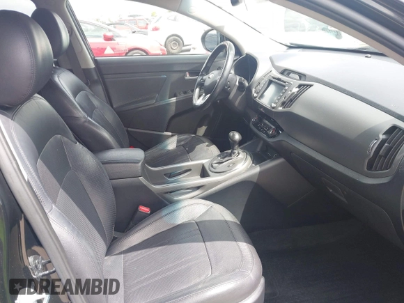 2013 Kia Sportage SX with VIN KNDPCCA61D7385219, listed as a IAAI auction lot 41945345 with 112,471 mi miles and . Bid and sale history available at carsss.com. Image 5.