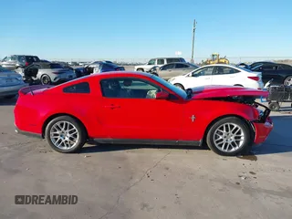 2012 Ford Mustang V6 Premium with VIN 1ZVBP8AM5C5262332, listed as a IAAI auction lot 41243050 with 105,157 mi miles. Bid and sale history available at carsss.com. Image 13.