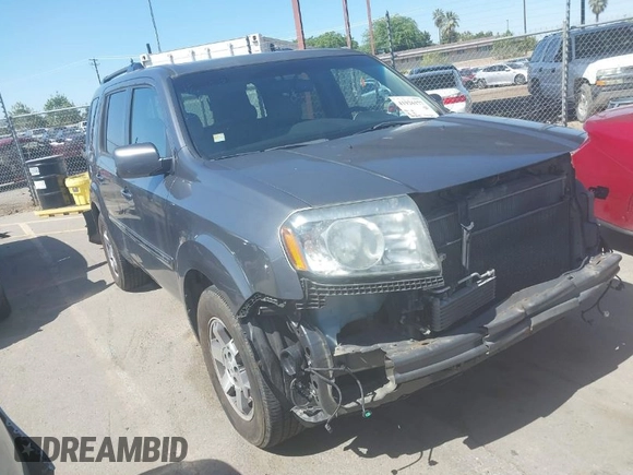 2011 Honda Pilot Touring with VIN 5FNYF4H96BB083532, listed as a IAAI auction lot 41926177 with 100,815 mi miles. Bid and sale history available at carsss.com. Image 1.