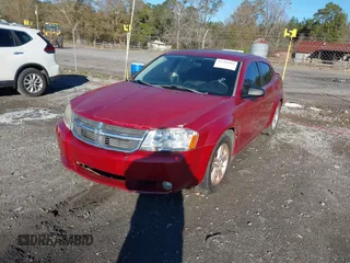 2009 Dodge Avenger SXT with VIN 1B3LC56B79N509420, listed as a IAAI auction lot 41356966 with 171,709 mi miles and . Bid and sale history available at DreamBid. Image 2.