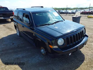 2014 Jeep Patriot Latitude with VIN 1C4NJRFB2ED501262, listed as a IAAI auction lot 42165657 with 107,551 mi miles and . Bid and sale history available at DreamBid. Image 1.